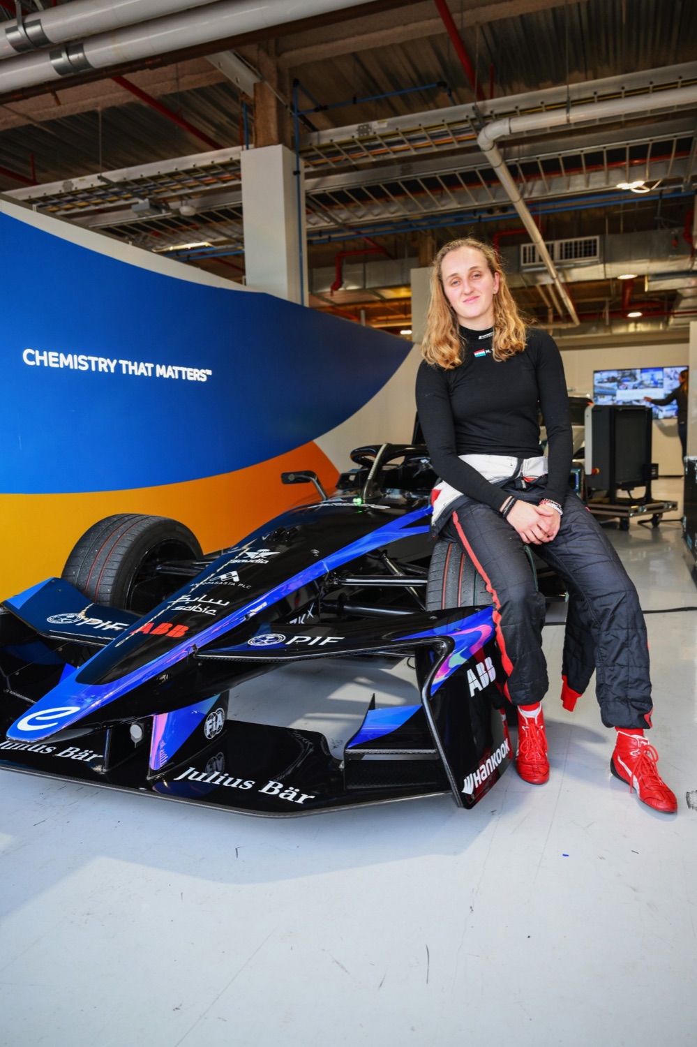 Maya Weug with the Formula E car